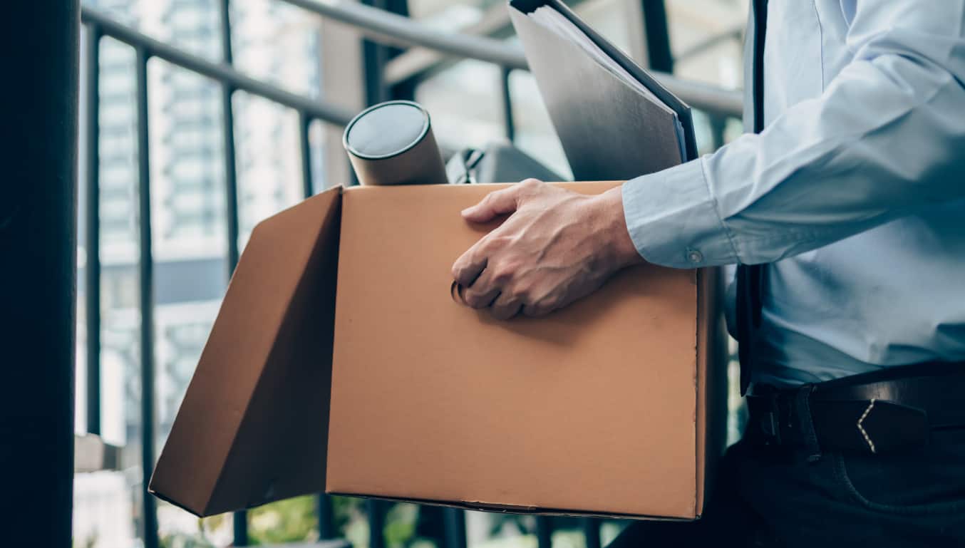office-man-carrying-cardboard-box-of-belongings