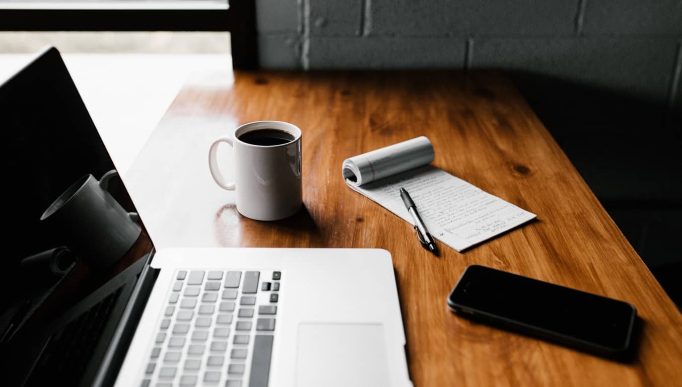 table-laptop-coffee-notepad-phone