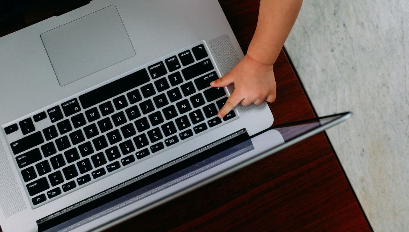 baby-touching-laptop-keyboard