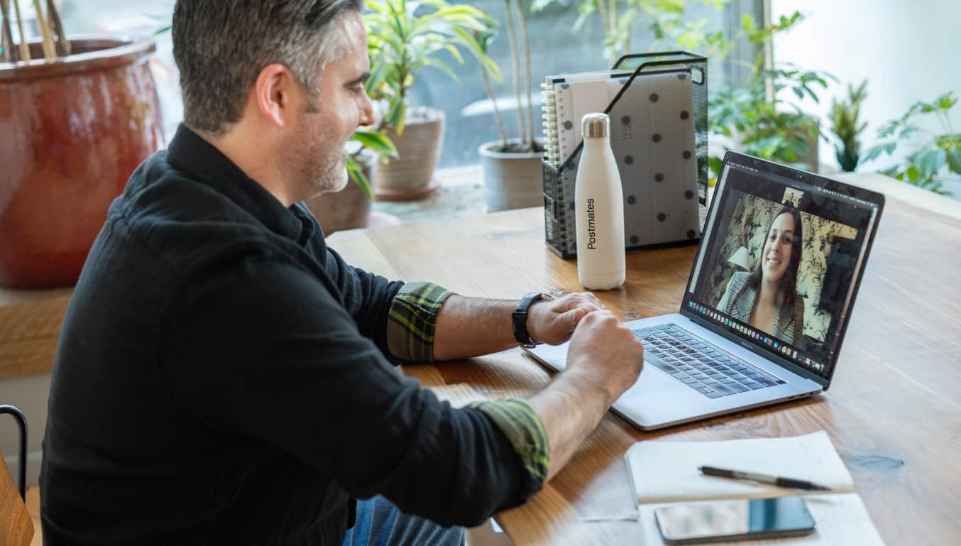 video-call-on-laptop-between-man-and-women