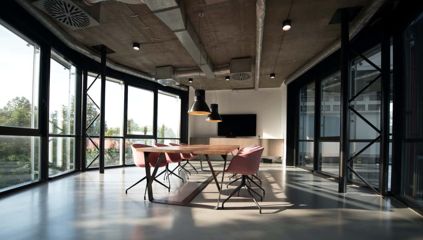board-room-table-with-pink-chairs