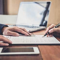 signing-a-document-with-a-fountain-pen