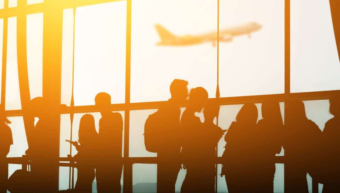 Passengers in an airport|Passengers in an airport