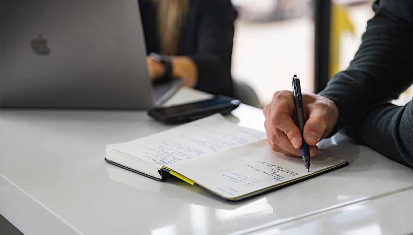 business_meeting-man-taking-notes