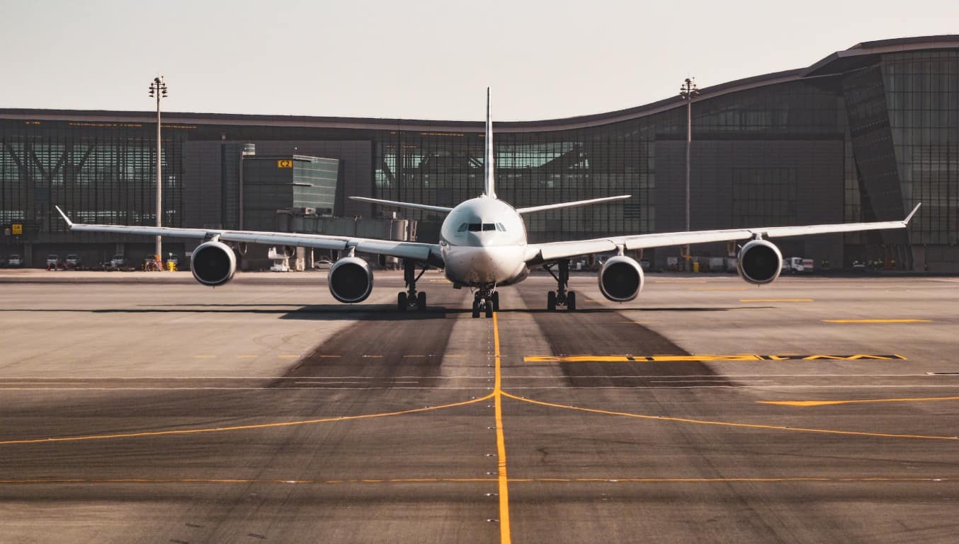 white-plane-runway-airport