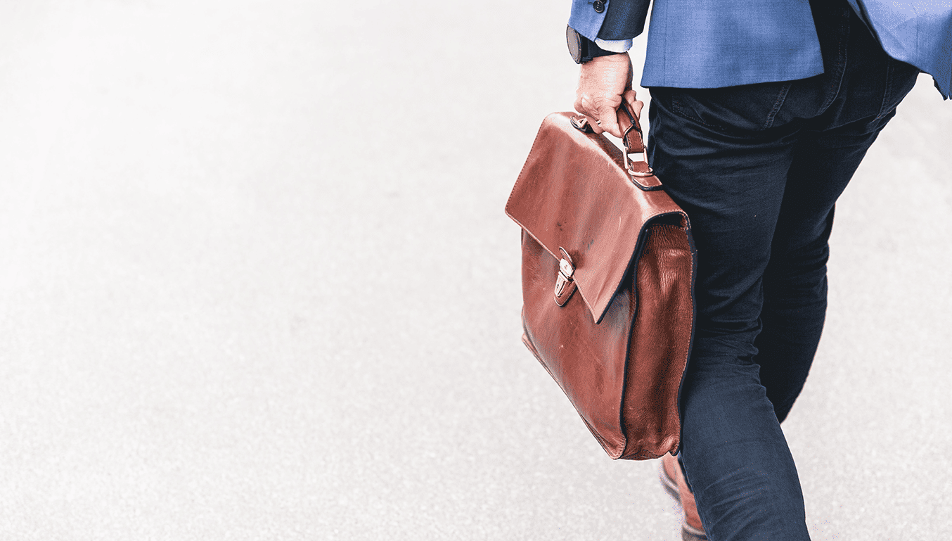 business_man_carrying_briefcase