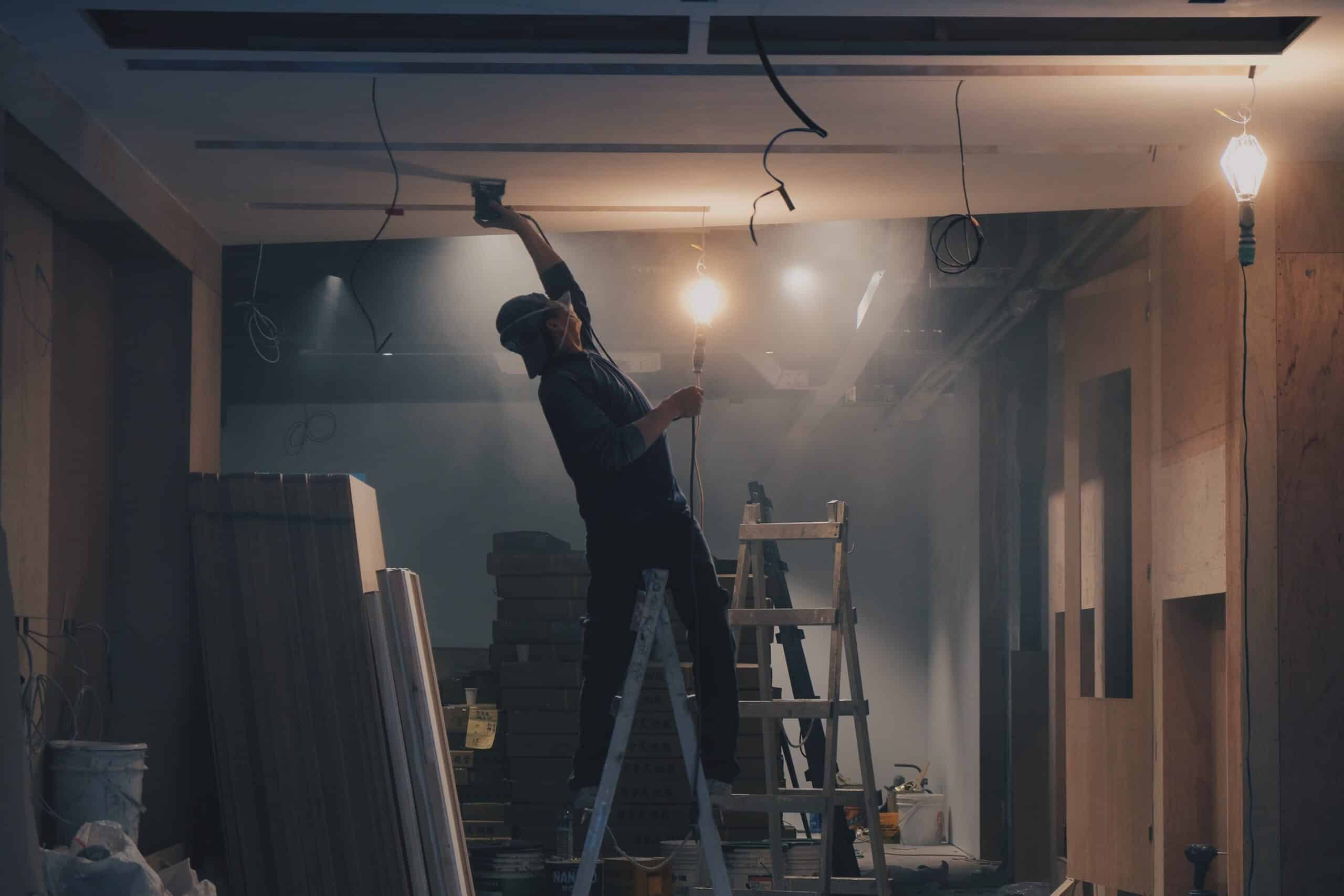plasterer up a ladder