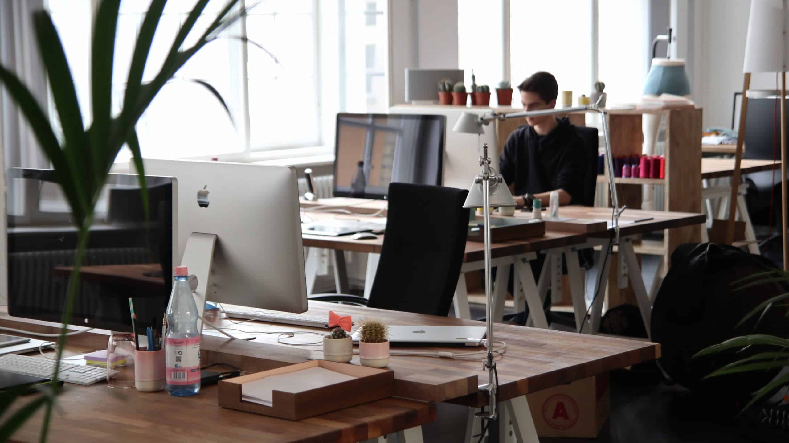 office-workers-tables-computers