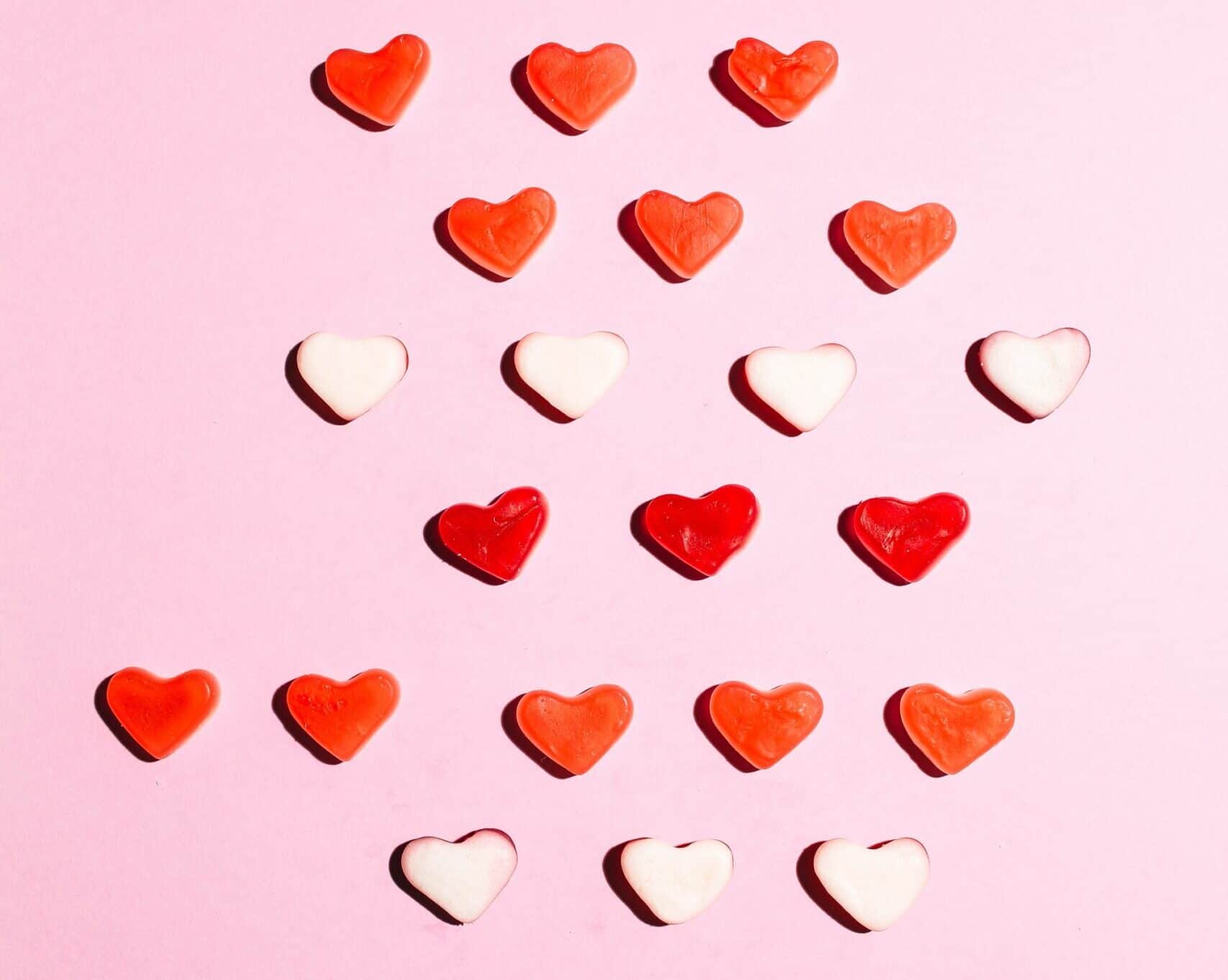 Haribo-heart-sweets-in-line-pink-background