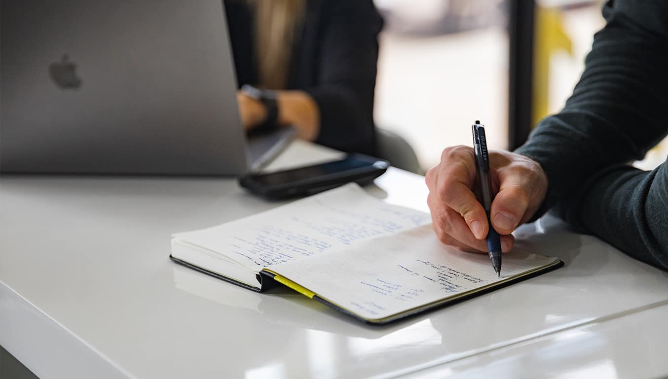business_meeting-man-taking-notes