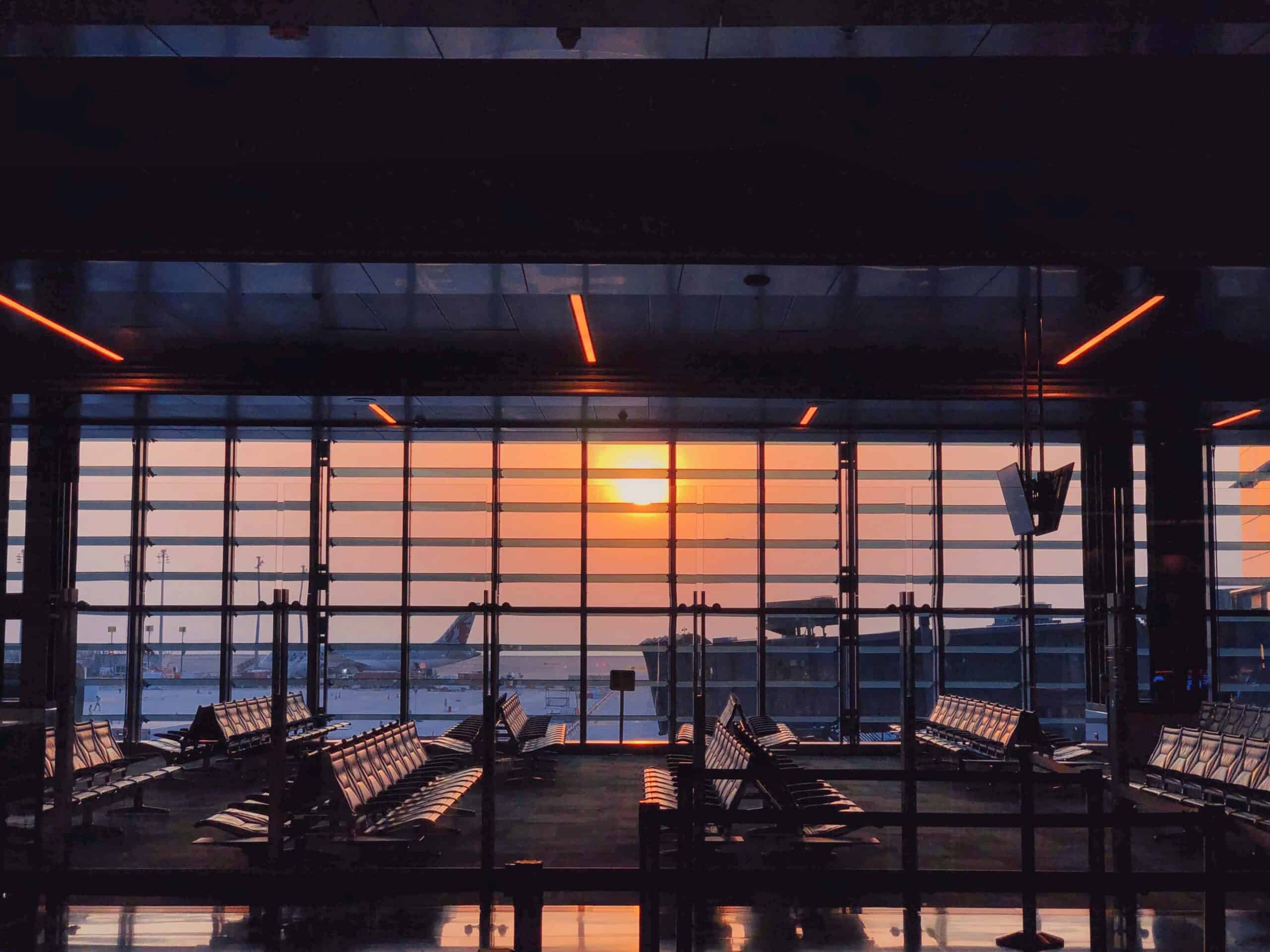 airport waiting room at sunset