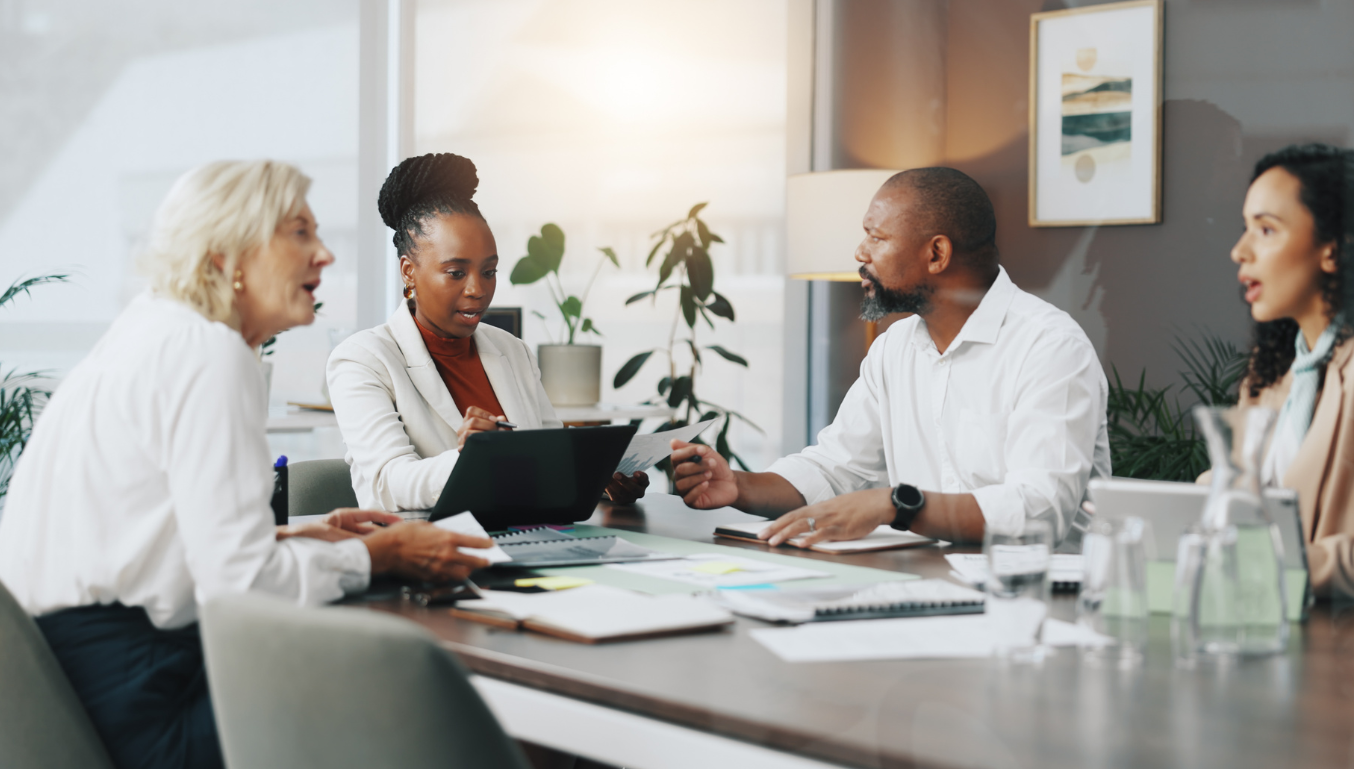 Laptop, planning and workshop with business people in office for strategy, project and research. Company growth, market report and brainstorming with employees in agency for discussion and teamwork