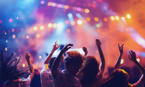 concert - view of lights and people dancing to a band