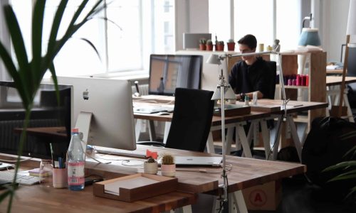 office-workers-tables-computers