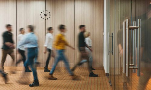 Group of office people walking at office open space. Team of business employees at coworking center. People at motion blur. Concept working at action